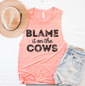 Blame it on the cows black writing